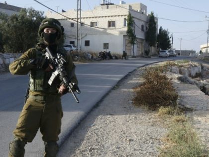 Israel locked down the West Bank town of Yatta on June 9, as they searched for clues after