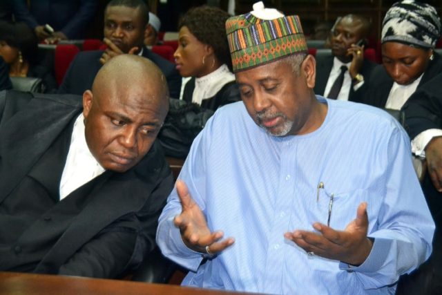 Former national security adviser of ex-president Goodluck Jonathan, Sambo Dasuki (R), spea