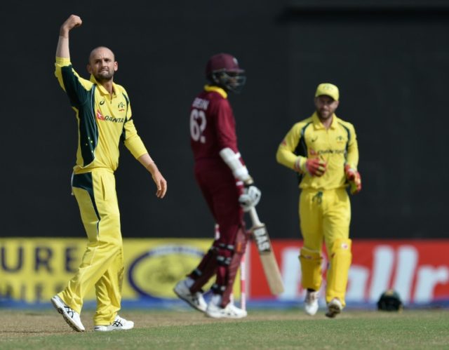 Australia's Nathan Lyon catches out the West Indies' Sulieman Benn on June 5, 2016