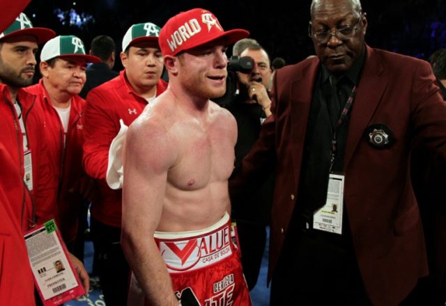 Saul "Canelo" Alvarez (C) of Mexico, pictured on May 8, 2016, will face undefeated Liam "B