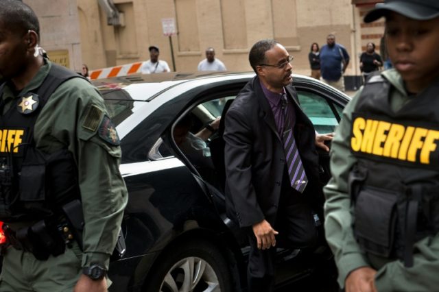 Baltimore Police Officer Caesar Goodson Jr. arrives for his trial in the death of Freddie