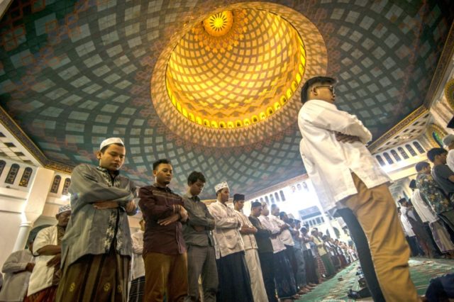 Indonesian Muslims hold prayers to mark the start of the holy month of Ramadan at the Al A