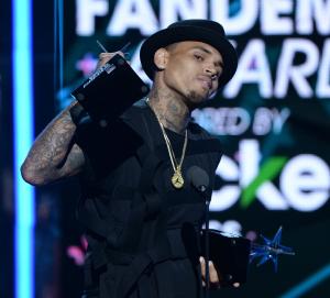 Chris Brown posts extensive expletive-filled explanation of why publicist left