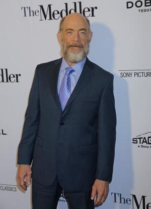 J.K. Simmons explains buff gym photo, likes to 'stay in decent shape'