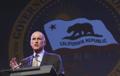 FILE - In this May 18, 2016 file photo, California Gov. Jerry Brown gestures during a community event in Sacramento, Calif. The Citizen Compensation Commission approved a 4 precent pay raise for Brown and other top elected California officials, Wednesday, June 1, 2016. (AP Photo/Rich Pedroncelli,File)