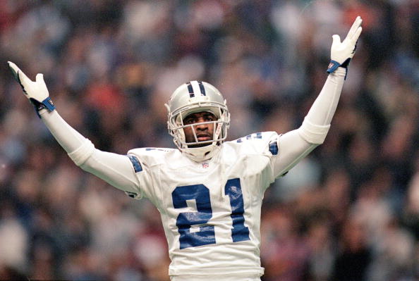 25 Nov 1999: Deion Sanders #21 of the Dallas Cowboys celebrates on the field during the ga