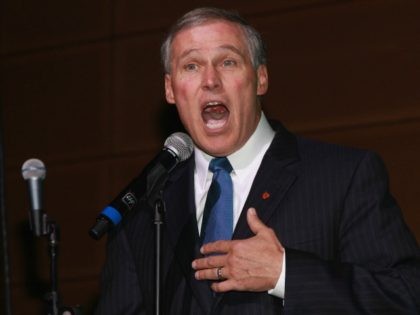Governor Jay Inslee speaks at the 2013 Green Inaugural Ball at NEWSEUM on January 20, 2013
