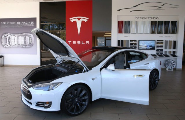 PALO ALTO, CA - NOVEMBER 05: A Tesla Model S car is displayed at a Tesla showroom on Nove