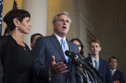House Majority Leader Kevin McCarthy (C), R-California, speaks to the press after dropping out of the race to become Speaker of the House on Capitol Hill in Washington, DC, October 8, 2015. AFP PHOTO/JIM WATSON (Photo credit should read JIM WATSON/AFP/Getty Images)