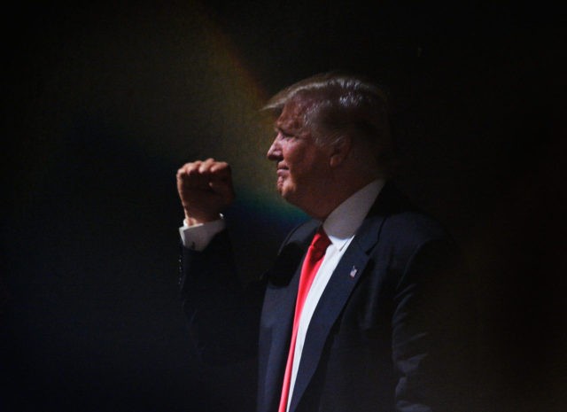 RALEIGH, NC - JULY 5: Presumptive Republican presidential nominee Donald Trump motions to the crowd while leaving the stage after a campaign event at the Duke Energy Center for the Performing Arts on July 5, 2016 in Raleigh, North Carolina. Earlier in the day Hillary Clinton campaigned in Charlotte, North …