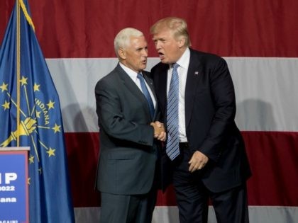 Republican presidential candidate Donald Trump greets Indiana Gov. Mike Pence at the Grand Park Events Center on July 12, 2016 in Westfield, Indiana. Trump is campaigning amid speculation he may select Indiana Gov. Mike Pence as his running mate. (Photo by