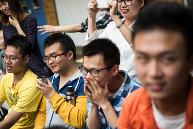 This photo taken on April 29, 2016 shows Chinese students having a laugh as they attend a course taught by Xie Shu (not pictured), a teacher at Tianjin University in the northeastern Chinese city of Tianjin. Xie's Theory and Practice of Romantic Relations course at Tianjin University includes lectures on …