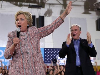 ANNANDALE, VA - JULY 14: Democratic presidential candidate Hillary Clinton (L) speaks a