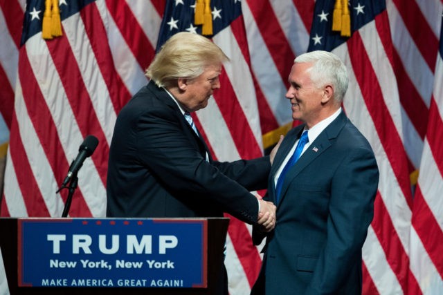NEW YORK, NY - JULY 16: (L to R) Republican presidential candidate Donald Trump shakes hands with his newly selected vice presidential running mate Mike Pence, governor of Indiana, during an event at the Hilton Midtown Hotel, July 16, 2016 in New York City. On Friday, Trump announced on Twitter …
