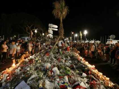This photo taken on July 16, 2016 in Nice shows a make-shift memorial for victims of the deadly Bastille Day attack. The Islamic State group claimed responsibility for the truck attack that killed 84 people in Nice on France's national holiday, a news service affiliated with the jihadists said on …
