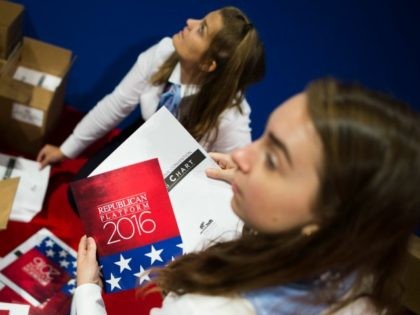 Volunteers organise pamphlets outlining the Republican party platform before the opening of the Republican National Convention on July 18, 2016 in Cleveland, Ohio