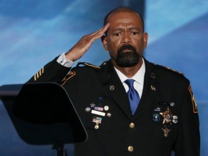 Milwaukee County Sheriff David Clarke salutes the crowd prior to delivering a speech on the first day of the Republican National Convention on July 18, 2016 at the Quicken Loans Arena in Cleveland, Ohio. An estimated 50,000 people are expected in Cleveland, including hundreds of protesters and members of the …
