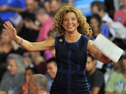 Congresswoman Debbie Wasserman Schultz of Florida arrives on stage during a campaign rally