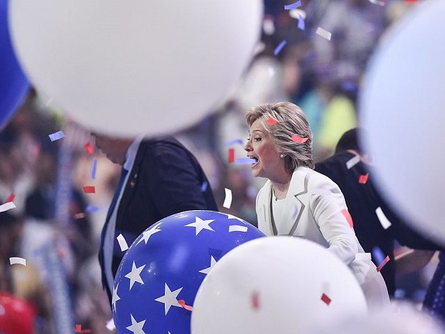 Balloons descend as Democratic presidential nominee Hillary Clinton celebrates on the four