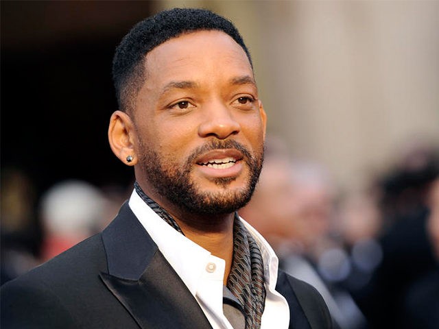 FILE - In this March 2, 2014 file photo, Will Smith arrives at the Oscars at the Dolby Theatre in Los Angeles. Smith, Jared Leto and Tom Hardy are suiting up for DC Comics’ supervillain team-up film “Suicide Squad.” Warner Bros. confirmed the much anticipated casting of the film in …