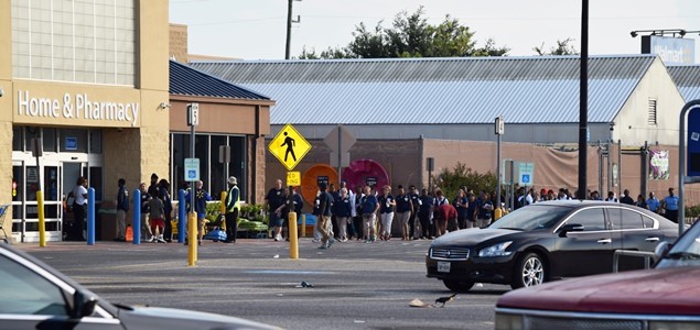 Walmart employees returning to store after bomb threat. (Photo: Bob Price/Breitbart Texas)