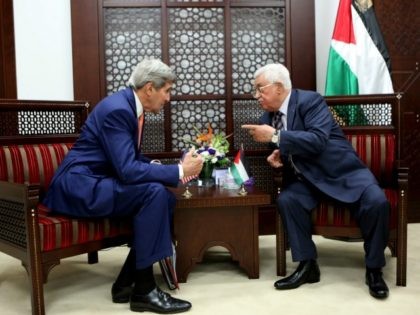 In this handout photo provided by the Palestinian Press Office, President Mahmoud Abbas meets with US Secretary of State John Kerry November 24, 2015 in Ramallah, West Bank. (Photo by Osama Falah/PPO via Getty Images)
