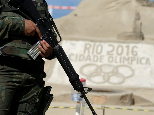 A Brazilian Army Forces soldier patrols on Copacabana beach ahead of the 2016 Rio Olympic