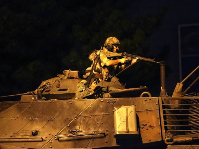 A tank drives on streets in Ankara, Turkey as people protest against military coup on July