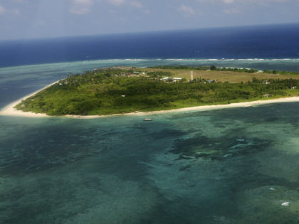 An aerial view shows the Pagasa (Hope) Island, part of the disputed Spratly group of islands, in the South China Sea located off the coast of western Philippines July 20, 2011. REUTERS/ROLEX DELA PENA/POOL
