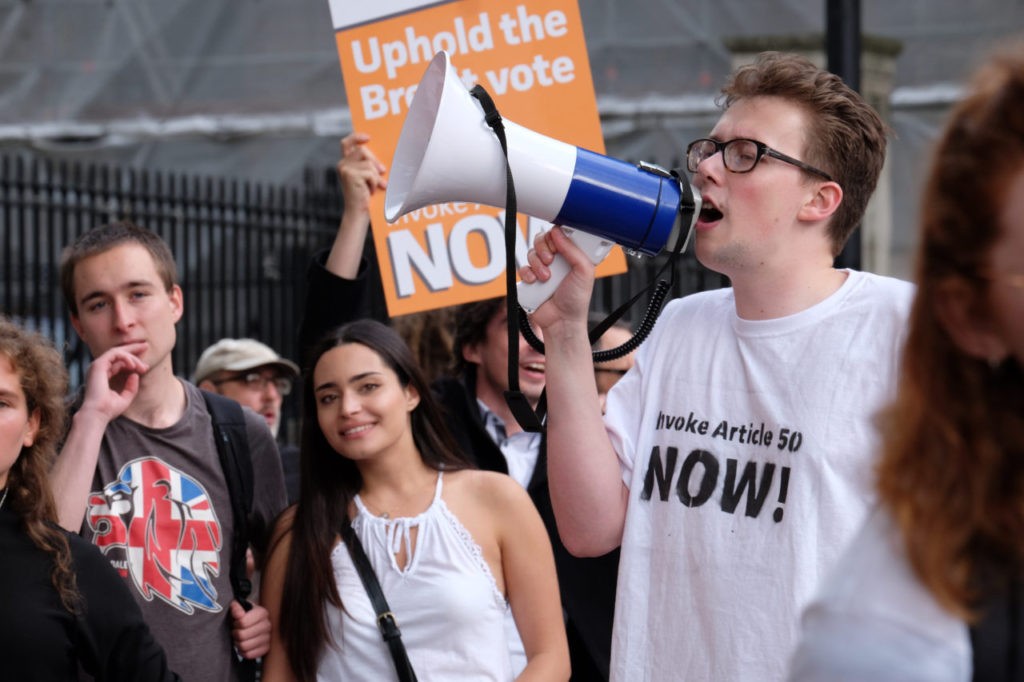 Various protesters, with differing views gathered as new PM arrives