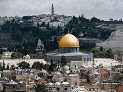 The Dome of the Rock is seen on the Al-Aqsa mosque compound surrounded by houses in Jerusalem's Old City, with the Mount of Olives in the background, on March 17, 2016. / AFP / THOMAS COEX (Photo credit should read THOMAS COEX/AFP/Getty Images)