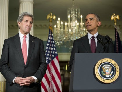 WASHINGTON, DC - FEBRUARY 25: (L-R) Secretary of State John Kerry looks on as U.S. Preside