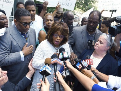 U.S. Rep. Corrine Brown addresses the media outside the Federal Courthouse, Friday, July 8, 2016, in Jacksonville, Fla. Brown and her chief of staff have been charged with multiple fraud and other federal offenses in a grand jury indictment unsealed Friday. (Bob Self/The Florida Times-Union via AP)