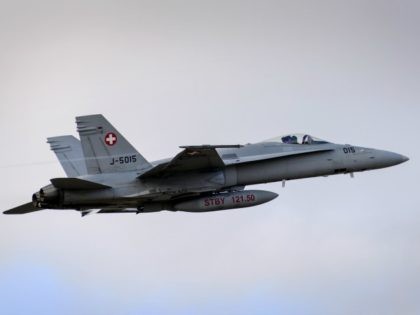 A F/A-18 Hornet fighter aircraft of the Swiss Air Force takes off on February 20, 2013 at