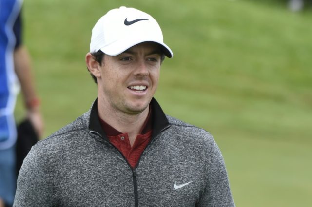 Northern Irish golfer Rory McIlroy reacts on the 16th green during the second round of the