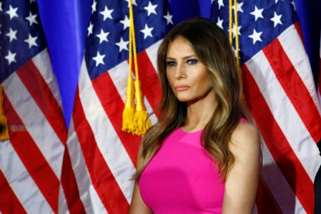Melania Trump, wife of Republican presidential candidate Donald Trump, listens as her husb