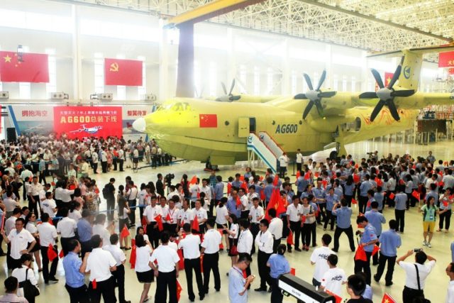 Crowd gathers at a ceremony to unveil the AG600 amphibious plane in Zhuhai, southern China