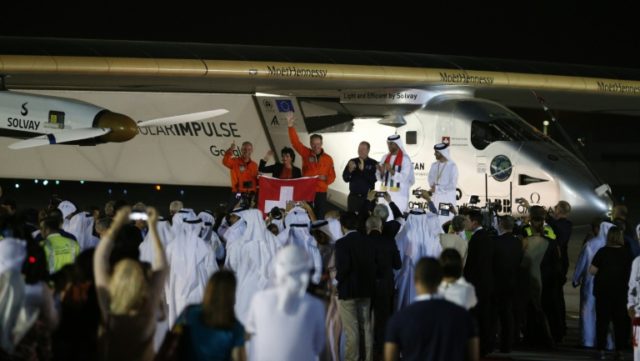 Solar Impulse 2 and crew are greeted upon arrival at Al Batin Airport in Abu Dabi on compl