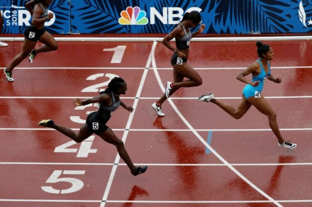 Kristi Castlin, Jasmin Stowers and Dawn Harper Nelson compete in the Women's 100 Meter Hur