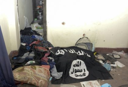An Islamic State group flag is seen in a handout photo released by Bangladeshi police of t