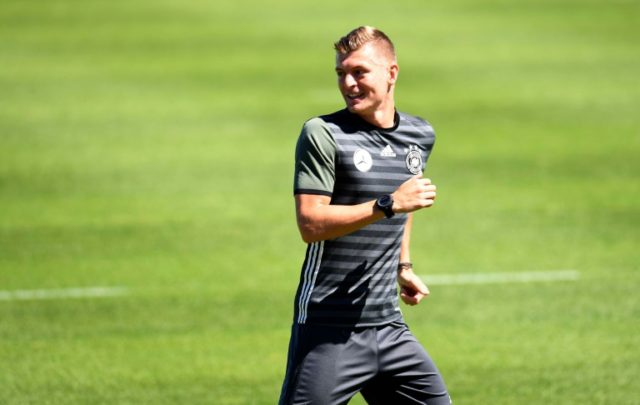German midfielder Toni Kroos warms up during a training session in Evian, on July 4, durin