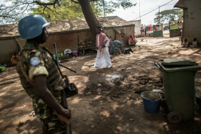 An armed Burundian UN "Blue Helmet" member of the peacekeeping force from the United Missi