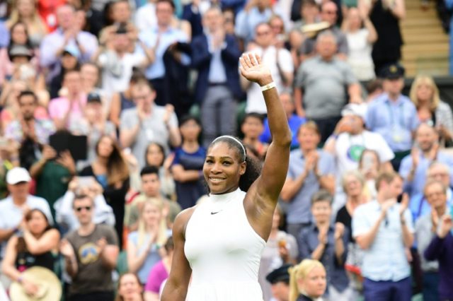 US player Serena Williams celebrates beating Russia's Svetlana Kuznetsova during their wom