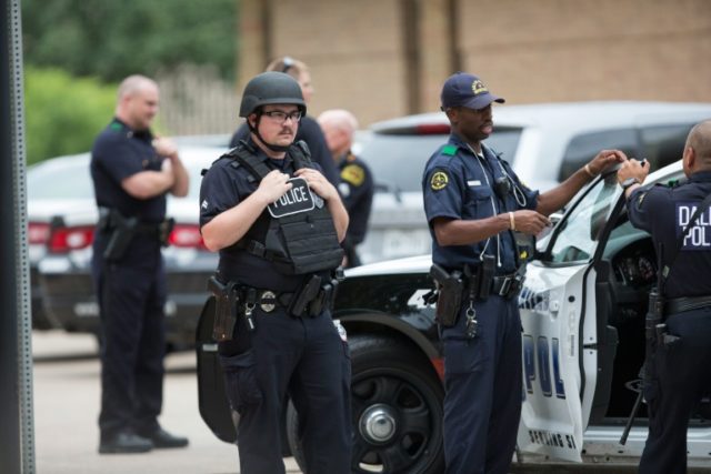 Police officers said the Dallas police headquarters was on lockdown, although the departm