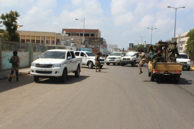 Yemeni troops surrounded the headquarters of the military garrison at Aden airport where b