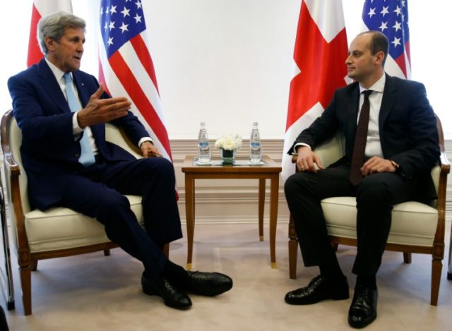 US Secretary of State John Kerry (L) meets with Georgian Foreign Minister Mikheil Janelidz