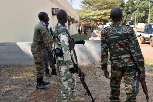 Central African Republic gendarmes and police officers stand guard in Bangui on January 2,