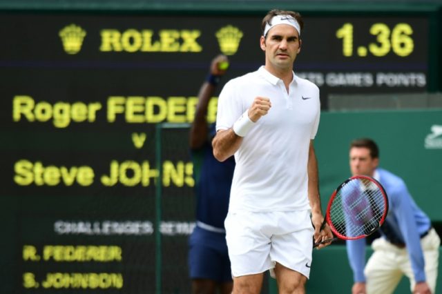 Switzerland's Roger Federer reached his 14th Wimbledon quarter-final by beating Steve John