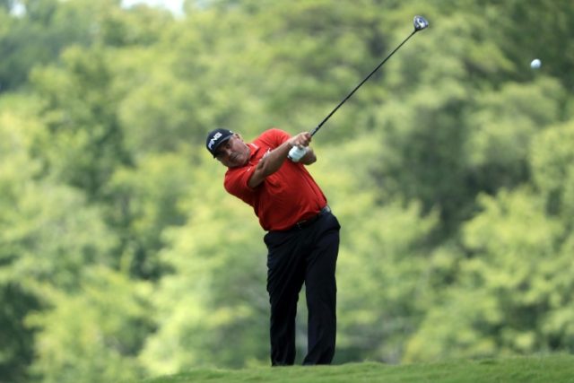Angel Cabrera holed a 60-foot putt for an eagle the par-five 13th and made birdies on the