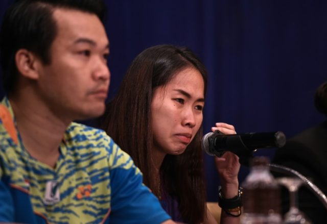 Thai Badminton star Ratchanok Intanon cries during a press conference regarding recent dop